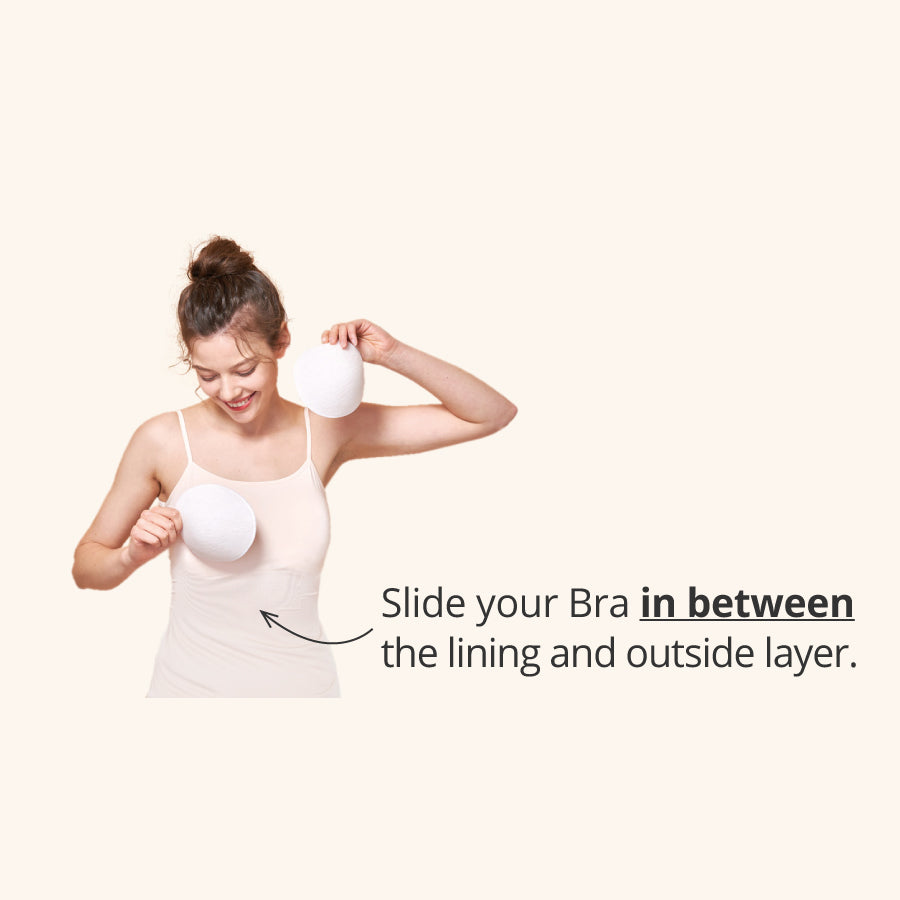 Slide in the Minism Bra in between the lining and the outside layer.  The absence of a rubber finish removes pressure from your chest which takes away any discomfort.