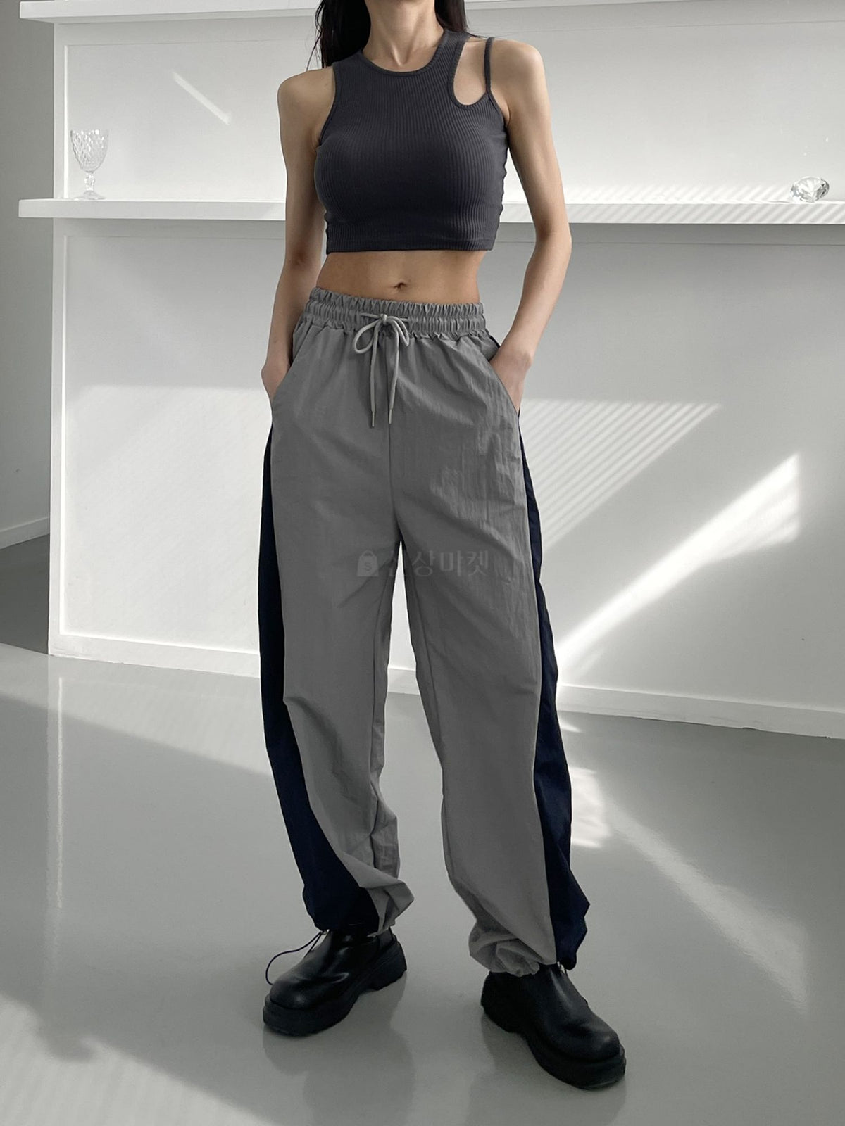 Le Sserafim Asymmetrical Open Shoulder Ribbed Crop Top