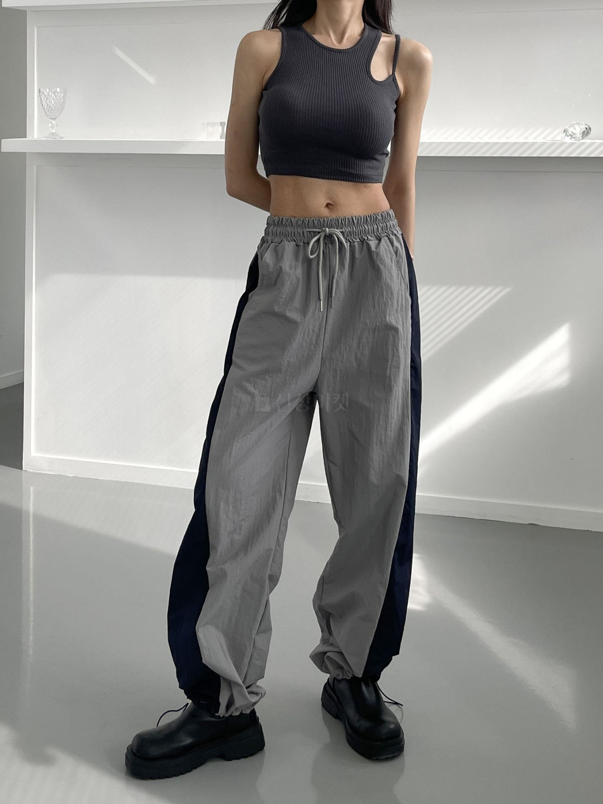 Le Sserafim Asymmetrical Open Shoulder Ribbed Crop Top
